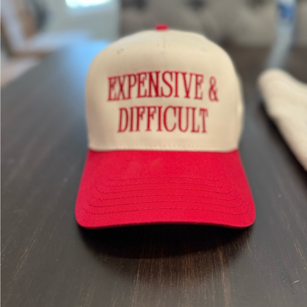 Red and White Cap with Bold Text